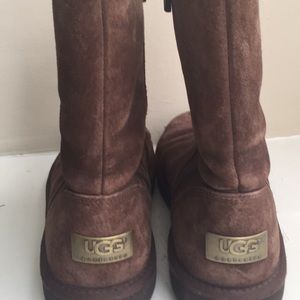 Brown UGG boots with a side zipper